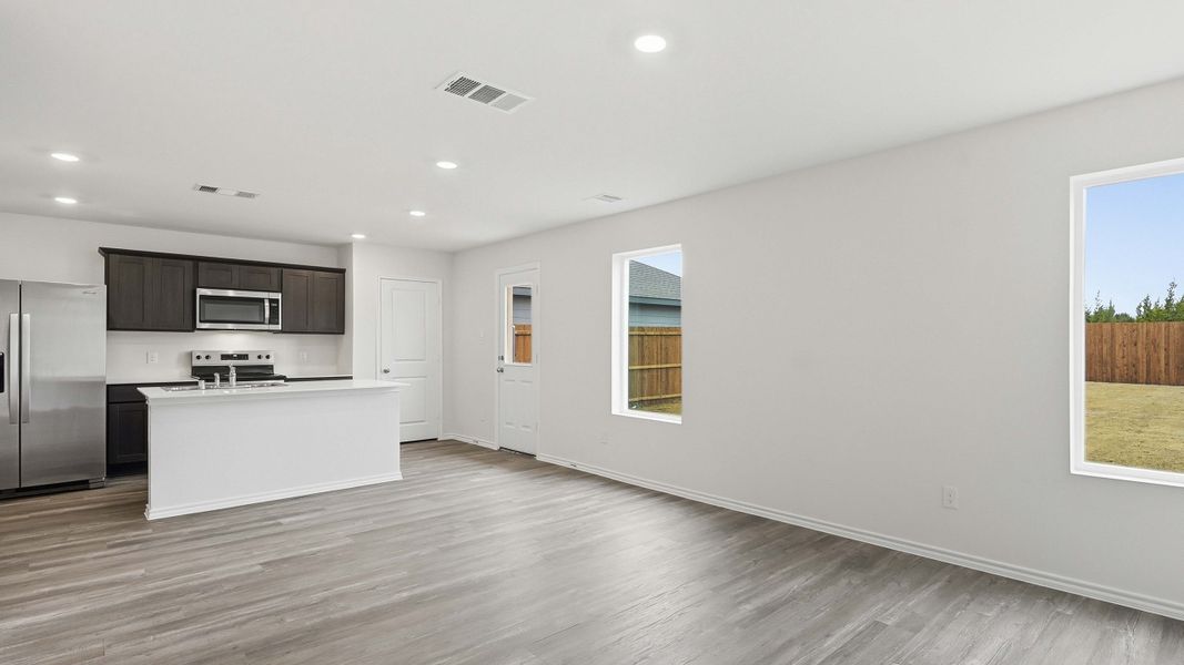 Representative unfurnished interior of a home built from the Davis by D.R. Horton in Maplewood Meadows, Forney (Image 12).