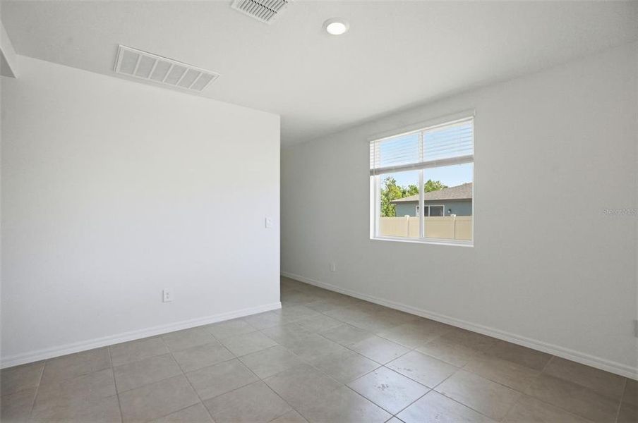Spacious, unfurnished interior of a new home in Leyland Preserve - Premier Series, Brooksville (Image 43).