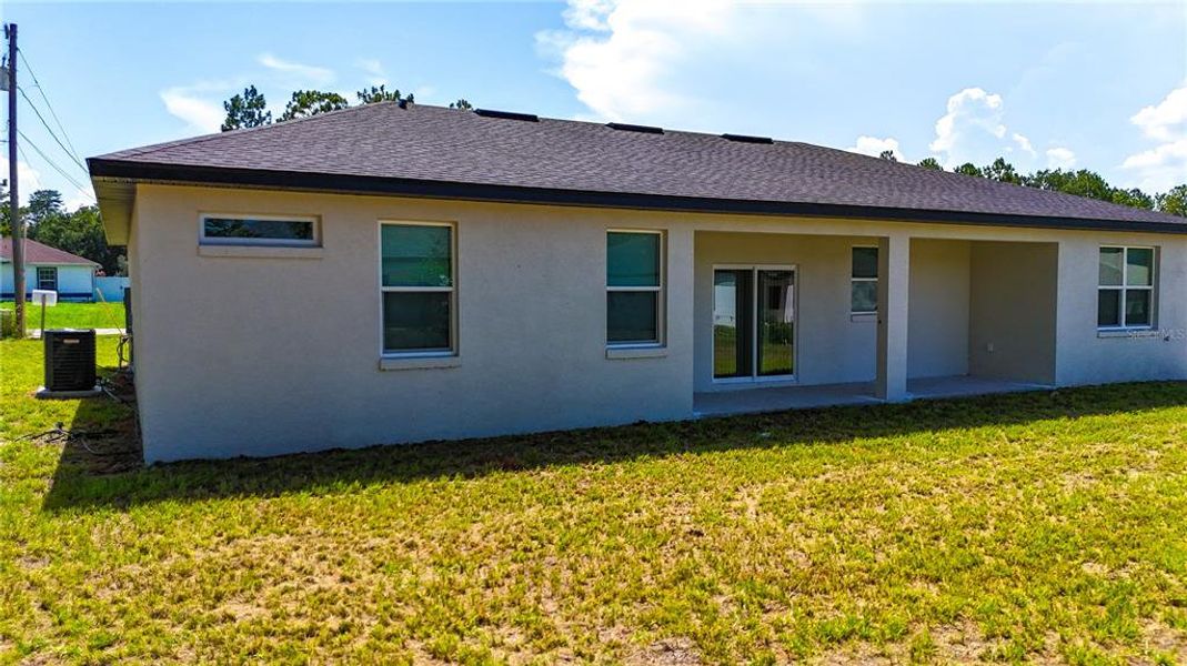 Front exterior of a new home in , Ocala, FL, highlighting curb appeal (Image 2).