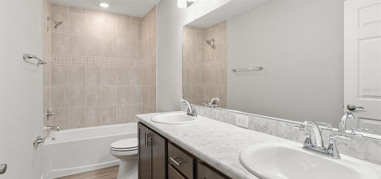 Furnished interior view inside a new home in Harbor at Lake Henry - Townhomes, Winter Haven (Image 8).