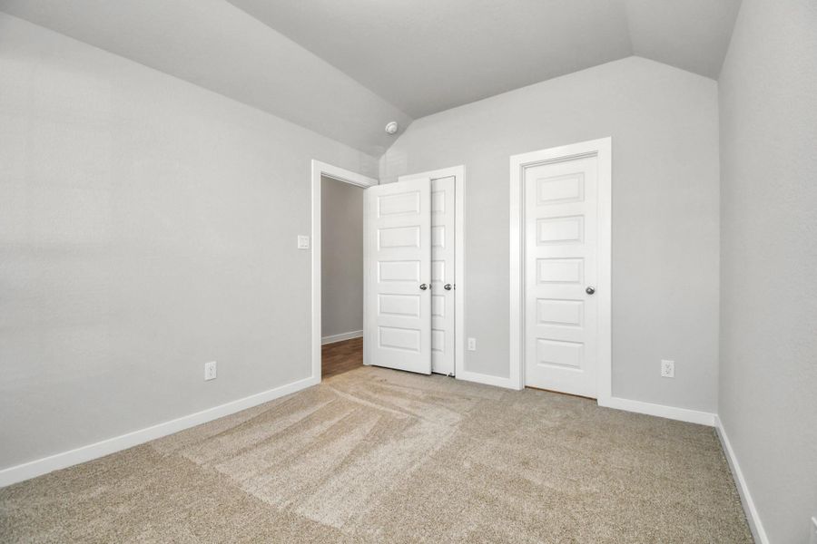 At the forefront of the home, a guest suite with its own bathroom awaits.