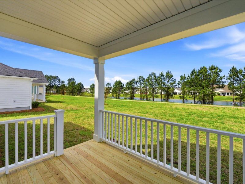 Exterior details and patio area of a home in The Coves at Lakes of Cane Bay II, Summerville (Image 3).
