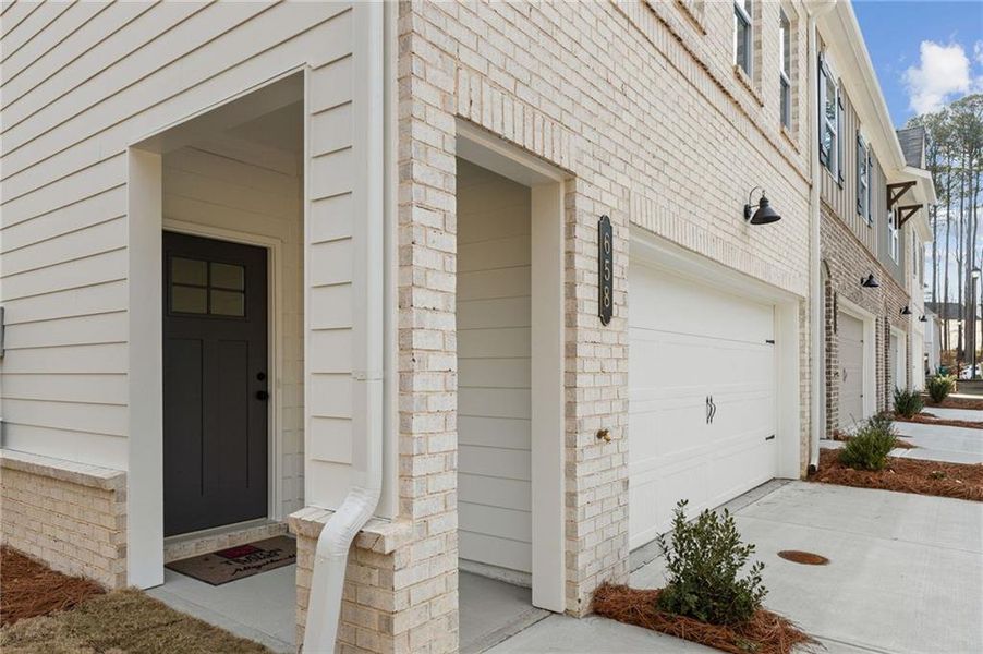 Exterior details and patio area of a home in River Walk Place, Lawrenceville (Image 3).