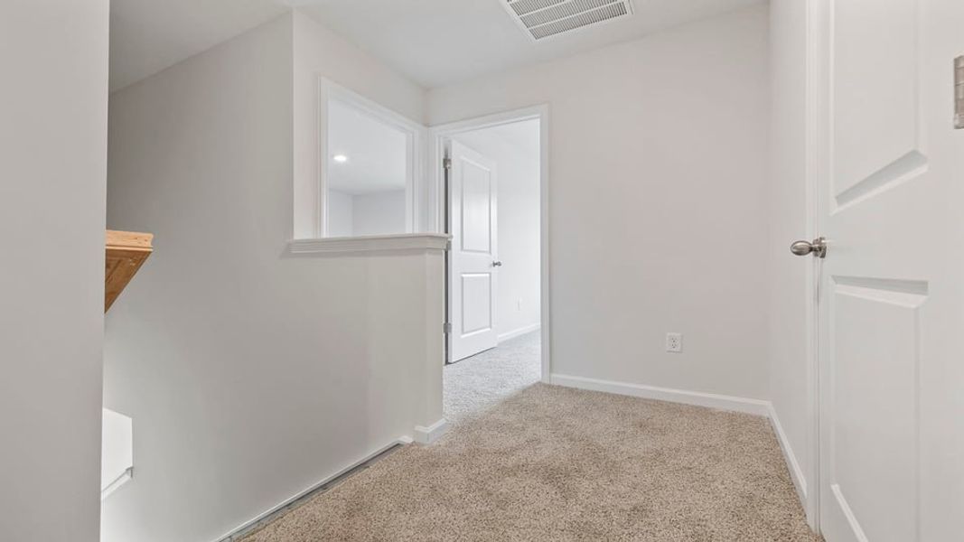 Spacious, unfurnished interior of a new home in Bentley Park, Greenwood (Image 25). Spacious, unfurnished interior of a new home in Bentley Park, Greenwood (Image 25).