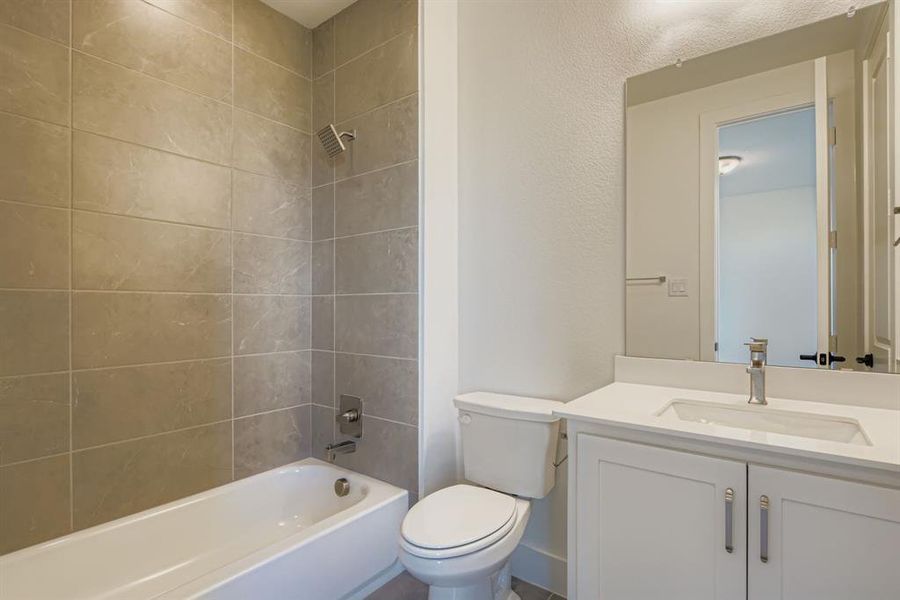 Bathroom with vanity and shower / washtub combination Bathroom with vanity and shower / washtub combination