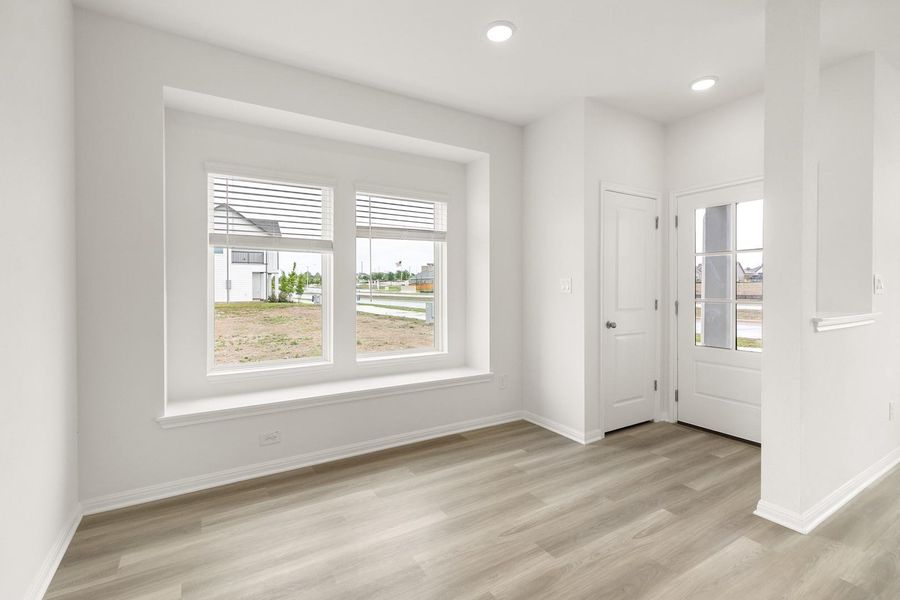 Foyer featuring plenty of natural light, light wood-type flooring, and recessed lighting