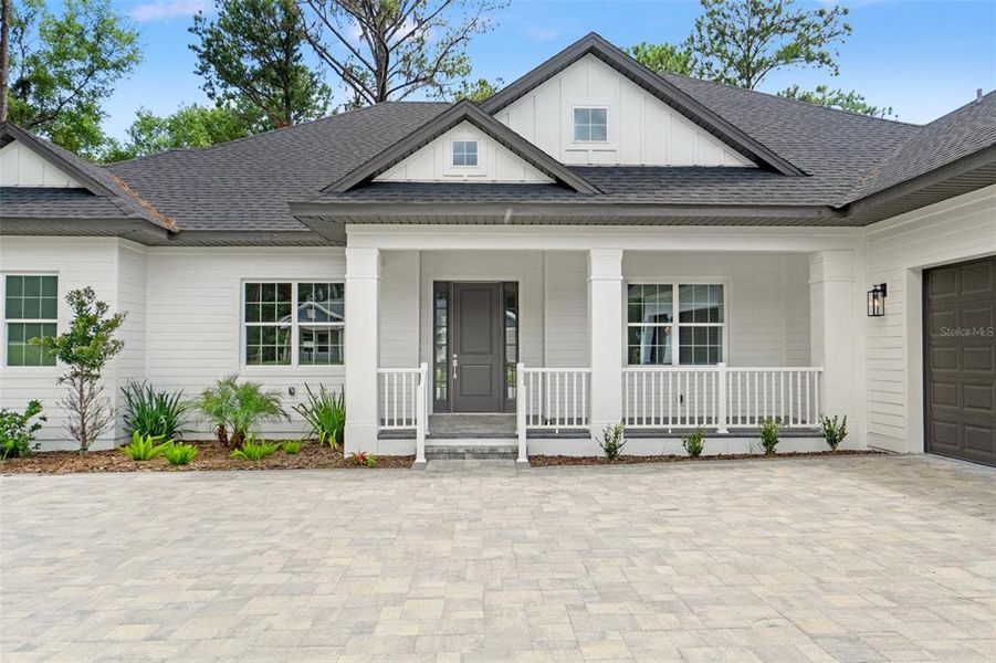 Front exterior of a new home in Southern Hills Plantation, Brooksville, FL, highlighting curb appeal (Image 27).