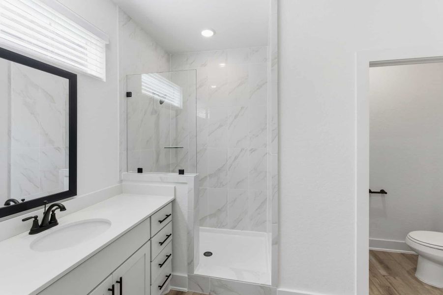 Furnished interior view inside a new home in Centero at Stone Oak, San Antonio (Image 13).