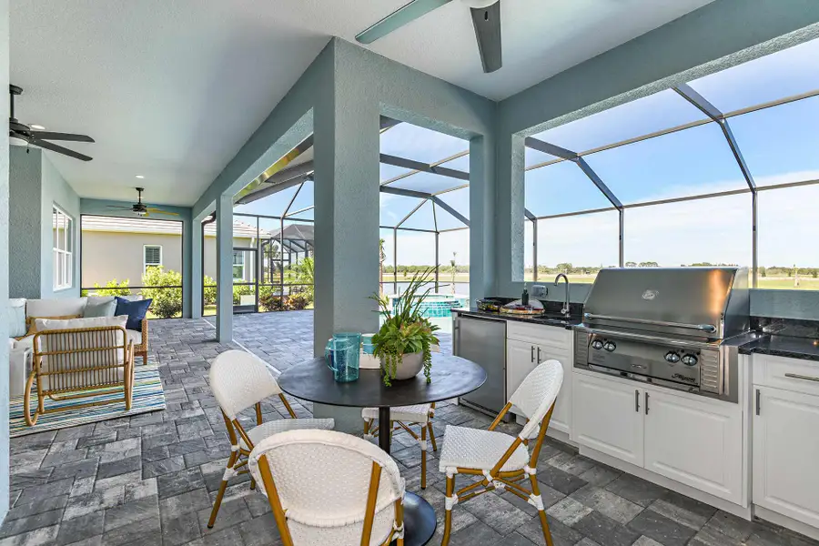 Representative exterior details of a home built from the Kiawah 2 by Neal Communities in SkySail, Naples (Image 4).