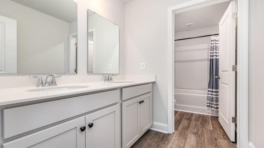 Furnished interior view inside a new home in Auberon Woods, Conway (Image 17).