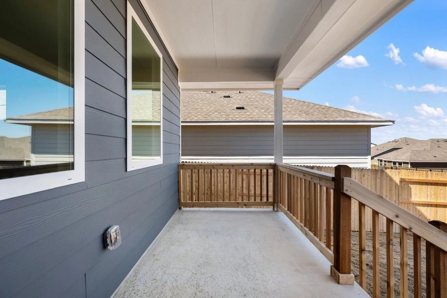 Exterior details and patio area of a home in Cannon Ranch, Dripping Springs (Image 27).