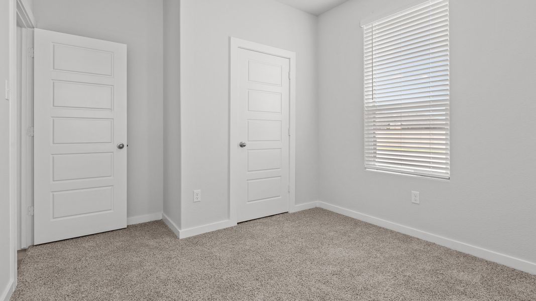 Representative unfurnished interior of a home built from the LAKE FORT by D.R. Horton in Heritage Parks, Abilene (Image 28).