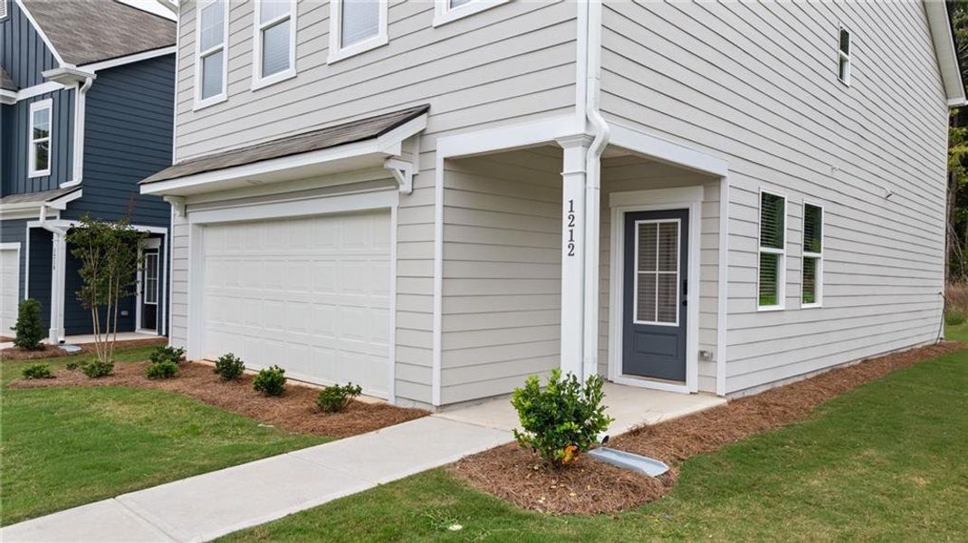 Exterior details and patio area of a home in Walden Park – The Retreat, Jonesboro (Image 3).