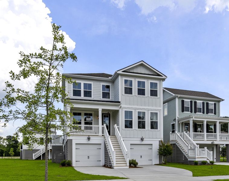 Front exterior of a new home in Miller's Crossing, Johns Island, SC, highlighting curb appeal (Image 19). Front exterior of a new home in Miller's Crossing, Johns Island, SC, highlighting curb appeal (Image 19).