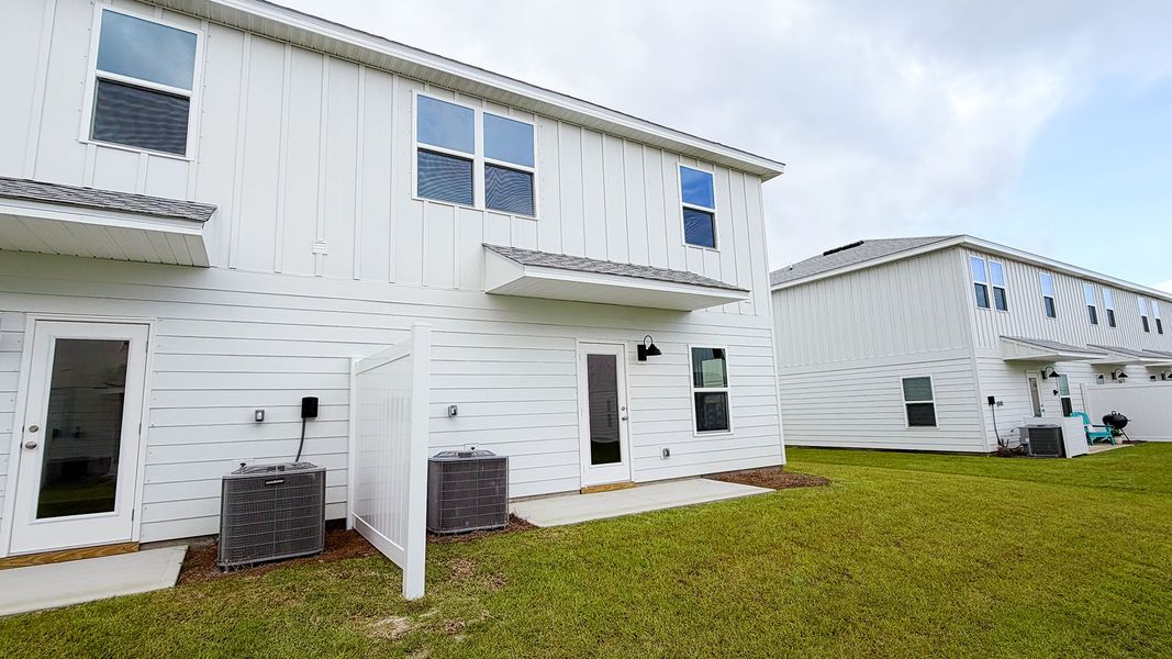 Exterior details and patio area of a home in Salt Creek Townhomes at Mexico Beach, Mexico Beach (Image 4). Exterior details and patio area of a home in Salt Creek Townhomes at Mexico Beach, Mexico Beach (Image 4).
