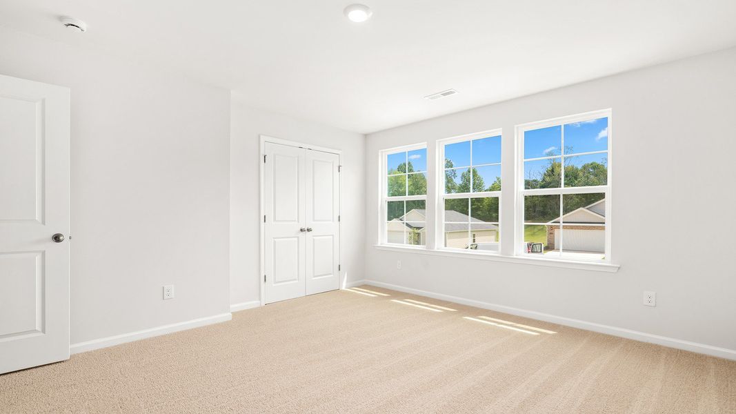 Spacious, unfurnished interior of a new home in Greystone North, Stoneville (Image 15).