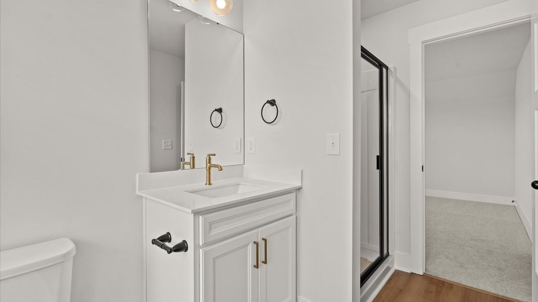 First-class guest bath featuring stylish fixtures and modern design elements First-class guest bath featuring stylish fixtures and modern design elements