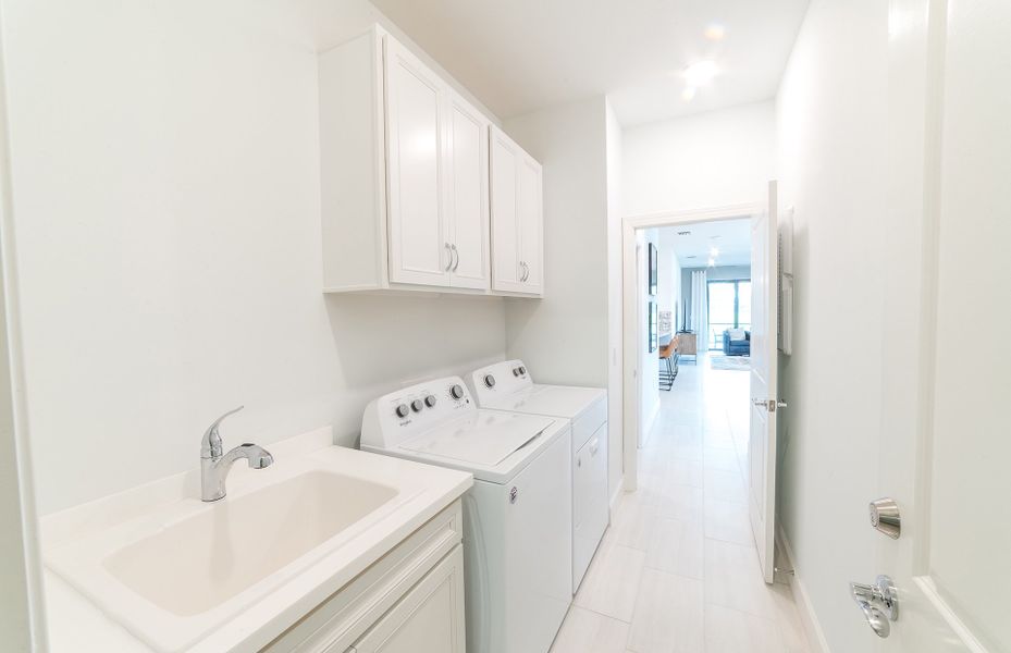 Laundry Room with Built-In Cabinets and Sink