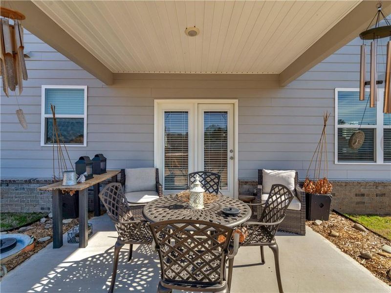 Exterior details and patio area of a home in Bridle Creek, Locust Grove (Image 4).