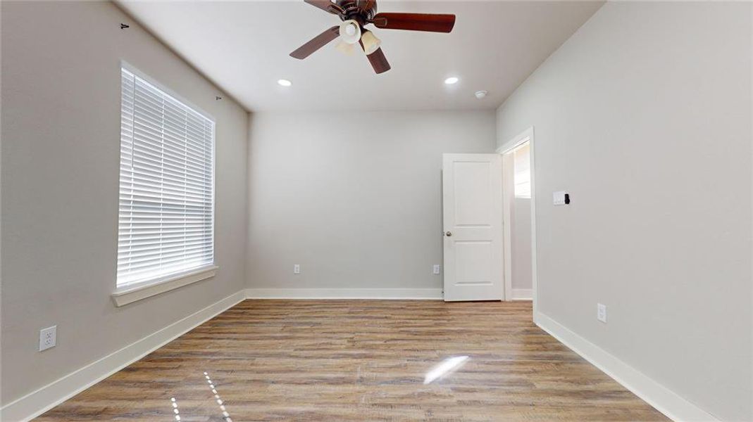 Another view of the primary bedroom.