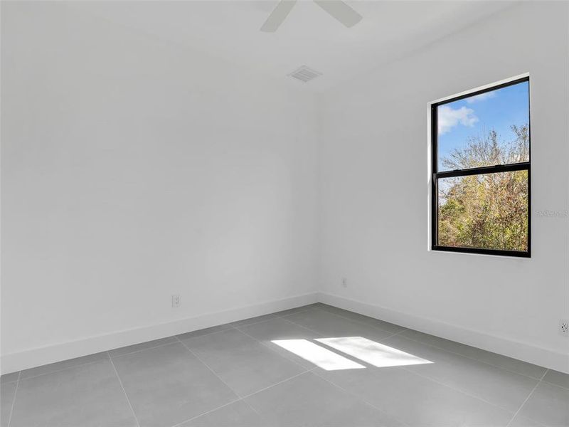 Spacious, unfurnished interior of a new home in , Port Charlotte (Image 44).