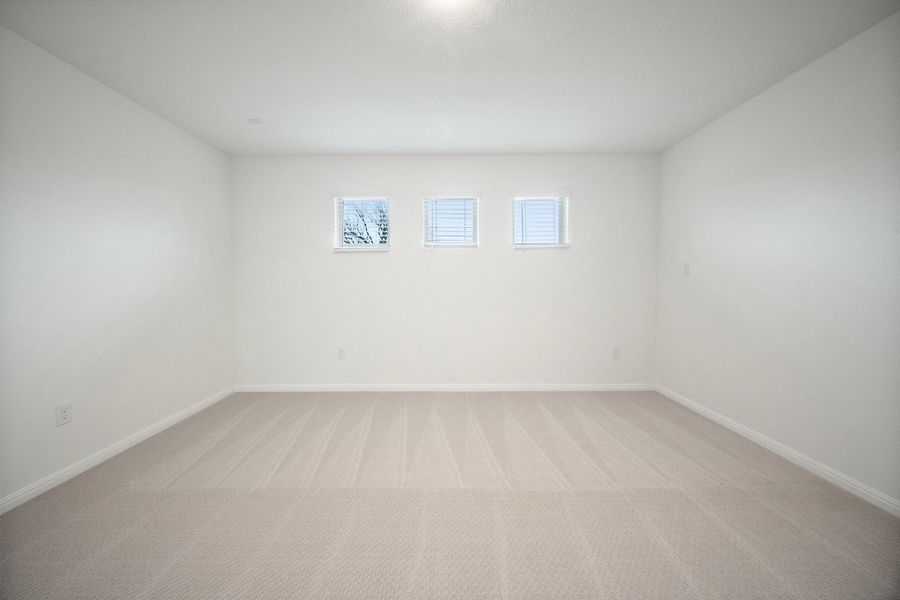 Spacious, unfurnished interior of a new home in The Hills of Bear Creek, Manchaca (Image 13).