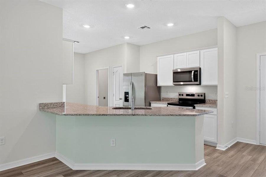 Furnished interior view inside a new home in , Deltona (Image 6).