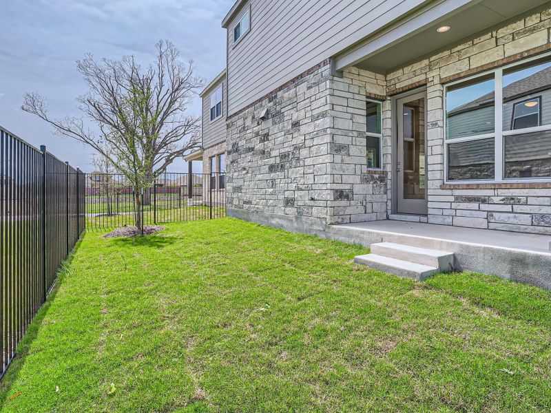 Exterior details and patio area of a home in Chester Ranch Place, Round Rock (Image 3).