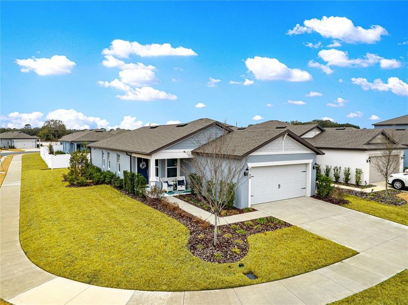 Front exterior of a new home in Pioneer Ranch, Ocala, FL, highlighting curb appeal (Image 23).