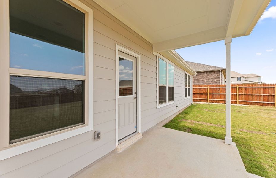 Exterior details and patio area of a home in Saddleback at Santa Rita Ranch, Liberty Hill (Image 28).