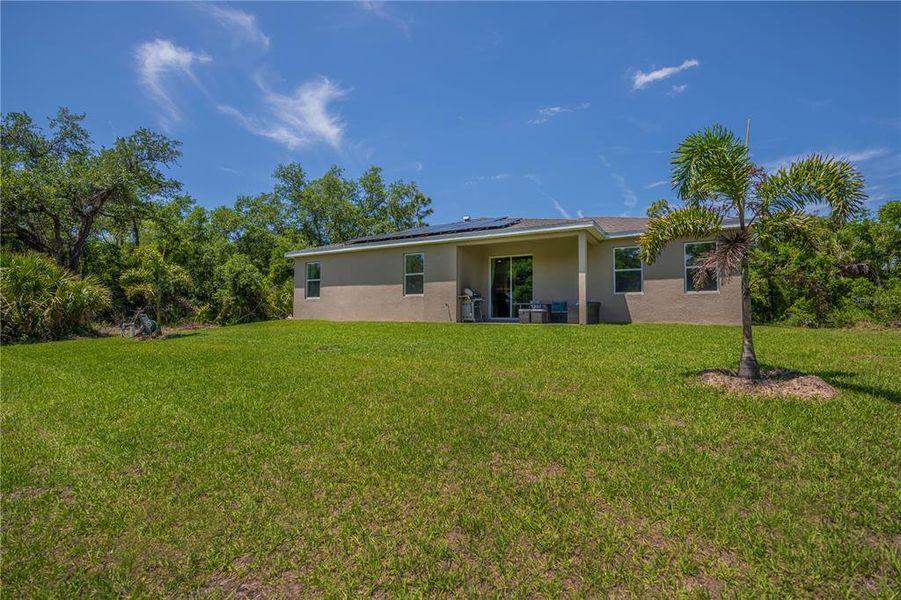 Exterior details and patio area of a home in , North Port (Image 24).