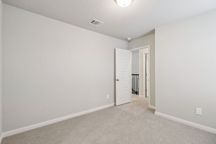 Spacious, unfurnished interior of a new home in Legendary Trails - Premier Series, Cibolo (Image 21).