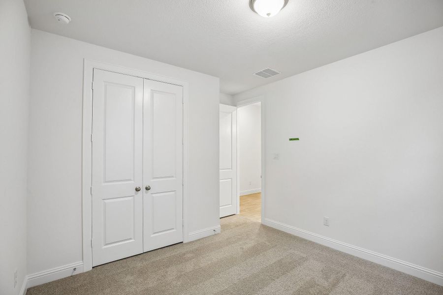 Spacious, unfurnished interior of a new home in Woodhavyn 40', Magnolia (Image 28). Spacious, unfurnished interior of a new home in Woodhavyn 40', Magnolia (Image 28).