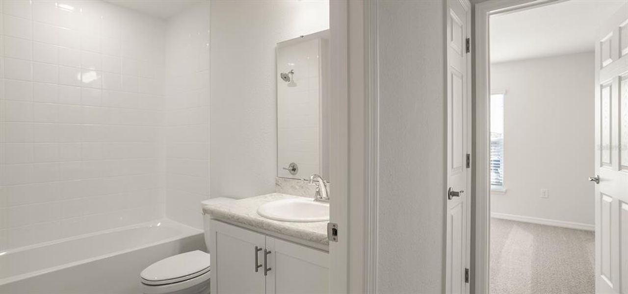 Furnished interior view inside a new home in Bennah Oaks, Belleview (Image 5).