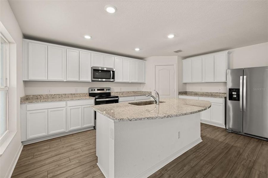 Furnished interior view inside a new home in , Poinciana (Image 9). Furnished interior view inside a new home in , Poinciana (Image 9).
