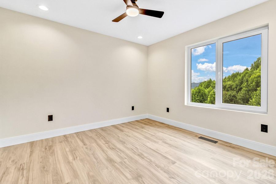 Spacious, unfurnished interior of a new home in , Hendersonville (Image 31).