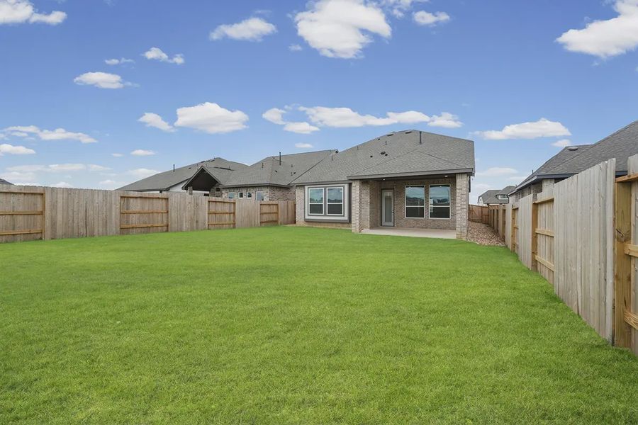 Exterior details and patio area of a home in Wildrye 45', Waller (Image 4). Exterior details and patio area of a home in Wildrye 45', Waller (Image 4).