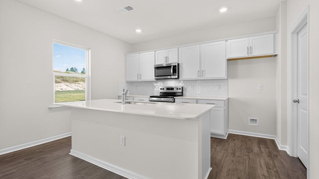 Furnished interior view inside a new home in Martin Farms, Aberdeen (Image 6).