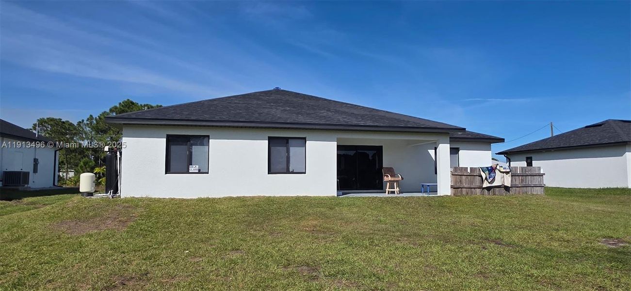 Exterior details and patio area of a home in , Lehigh Acres (Image 2).