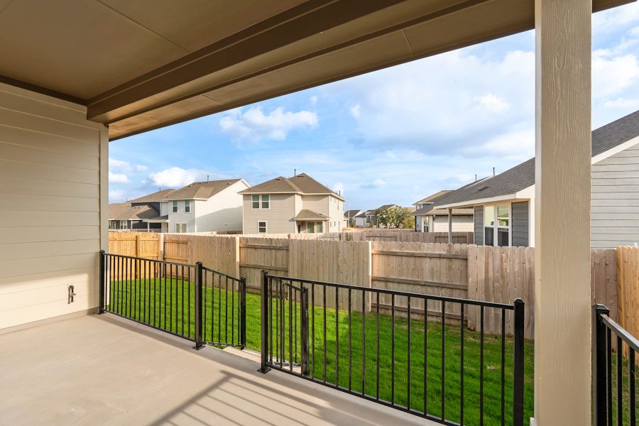Exterior details and patio area of a home in Lariat, Liberty Hill (Image 22).