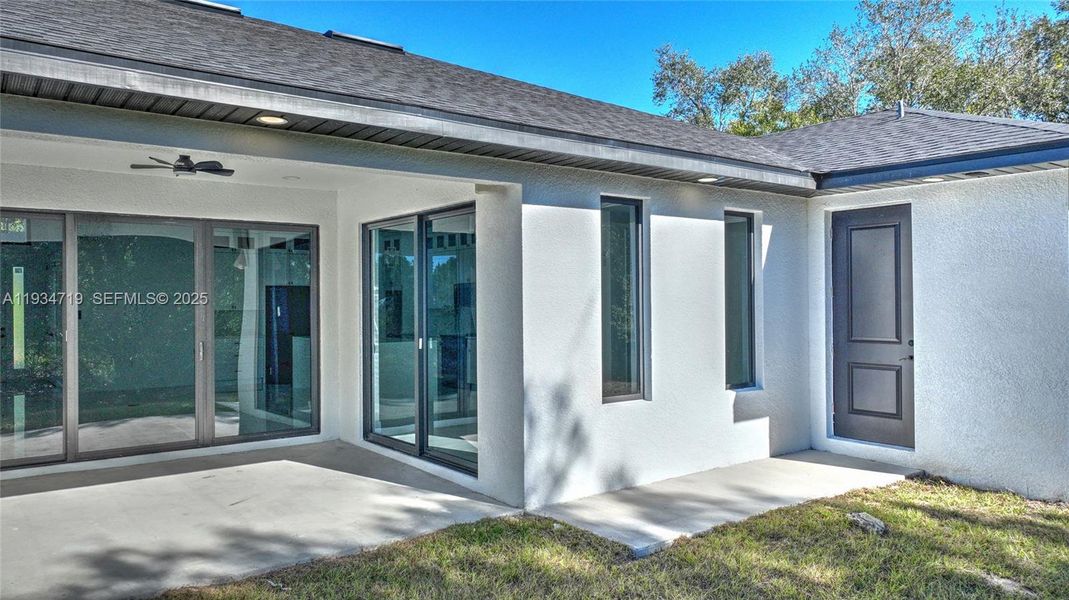 Exterior details and patio area of a home in , Lehigh Acres (Image 4).