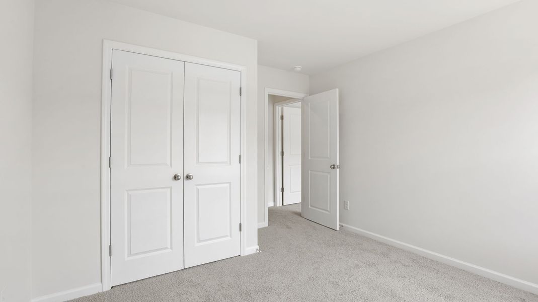 Spacious, unfurnished interior of a new home in Wildbrook Village, Waynesville (Image 24).