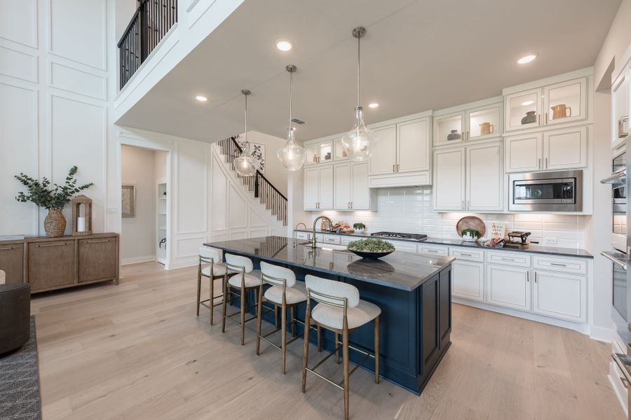Representative furnished interior of a home built from the Woodbridge by Tri Pointe Homes in Bridgeland, Cypress (Image 15).