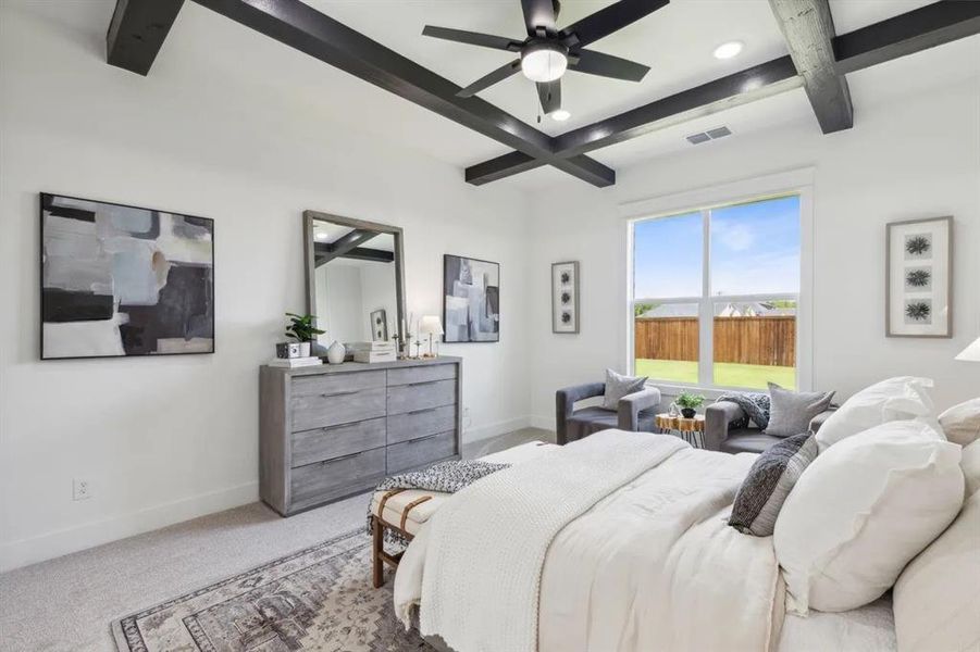 Carpeted bedroom with coffered ceiling, recessed lighting, and ceiling fan