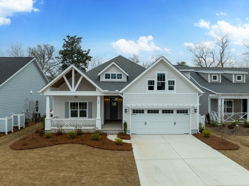 Representative exterior photo of a completed home built from the Kauai by Bill Clark Homes in The Sanctuary at Sunset Beach, Sunset Beach, NC (Image 31).