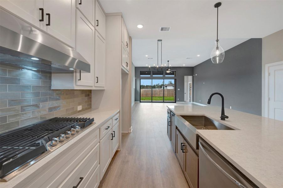 Furnished interior view inside a new home in COLTON - Reserve Collection, Todd Mission (Image 34).