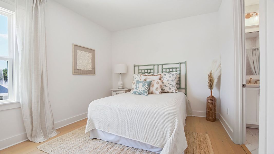 Representative furnished interior of a home built from the Brayden by D.R. Horton in Parkside, Santa Rosa Beach (Image 34).