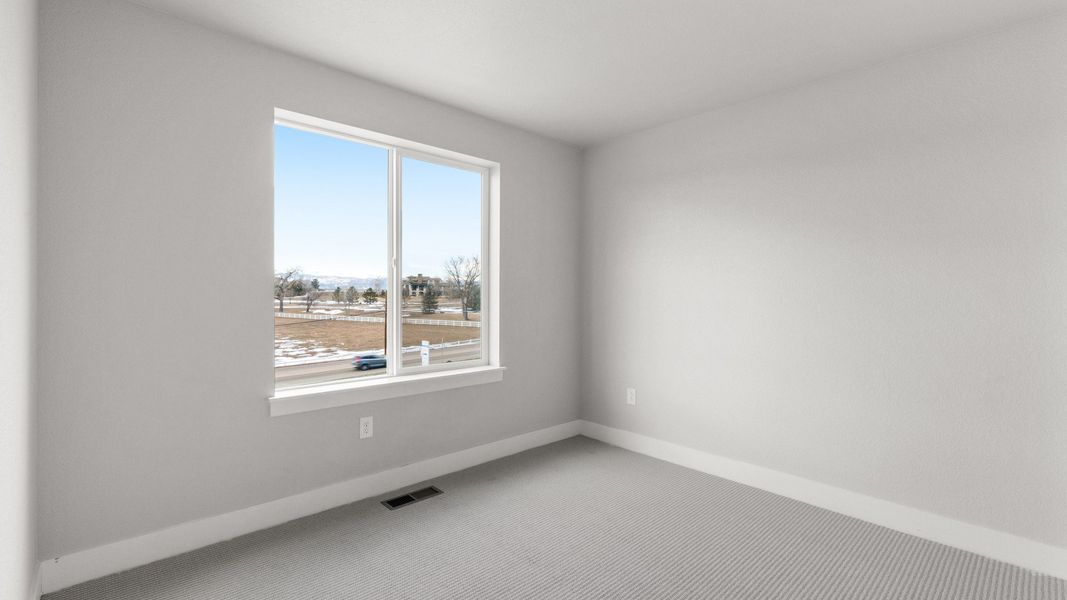 Furnished interior view inside a new home in Dillon Pointe - Skyview, Broomfield (Image 17).