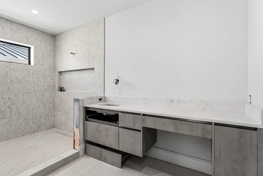 Primary bathroom with dual vanities; walk in shower Primary bathroom with dual vanities; walk in shower