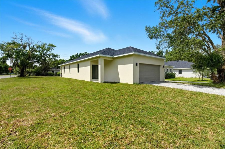 Front exterior of a new home in , Sanford, FL, highlighting curb appeal (Image 15).